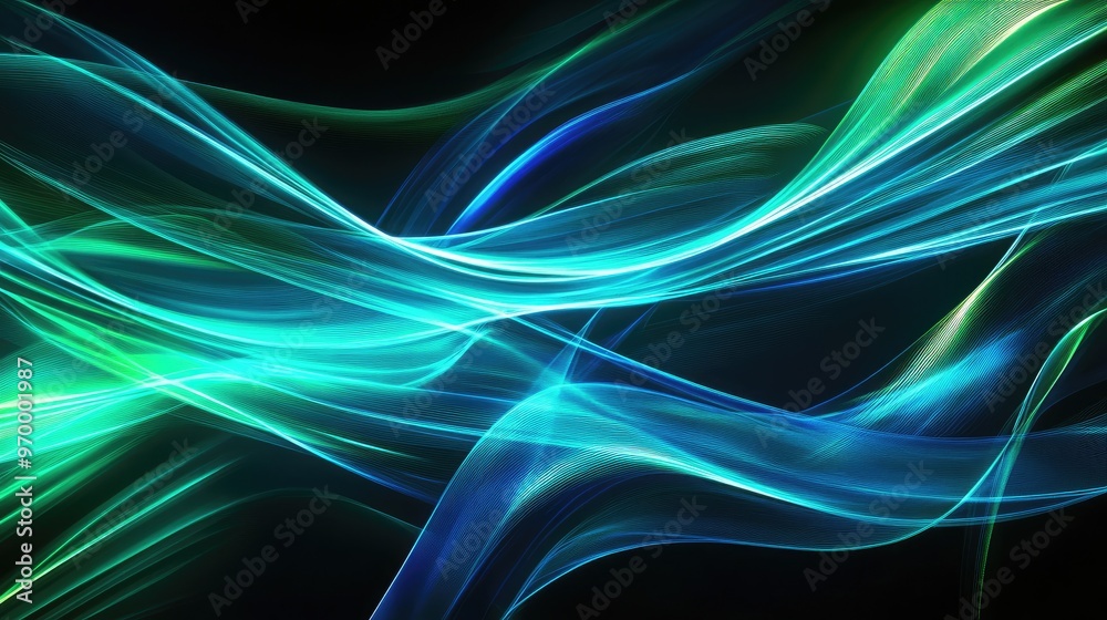 Fototapeta premium Abstract turquoise and green light streaks on black background.