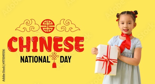 Little Asian girl with gift...