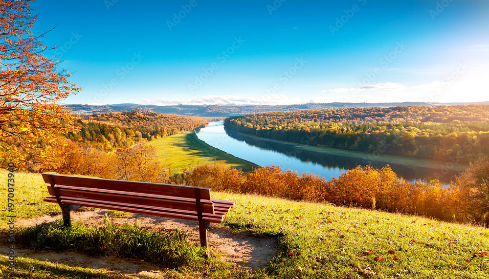 Obraz premium Parkbank in Herbstlandschaft 