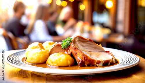 Schweinebraten mit Knödeln im Biergarten  photo