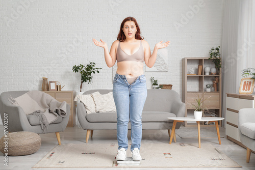 Overweight young shocked wo...