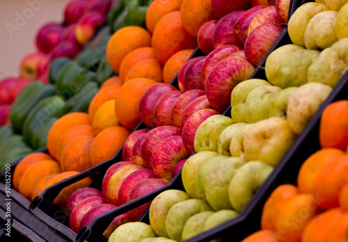 Delicious fruits and vegetables for a healthy diet. Oranges, Tangerines, Pears, Peppers, Red Apples, Green Apples, Cherry Tomatoes, Squashes.