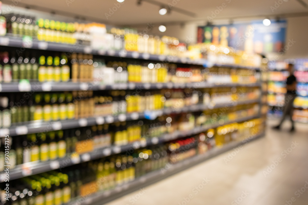 Abstract blur shelfs in supermarket. Grocery store interior defocused backdrop, wide merchandise range, vibrant supermarket aisle, shopping environment, assortment of goods on shelves.