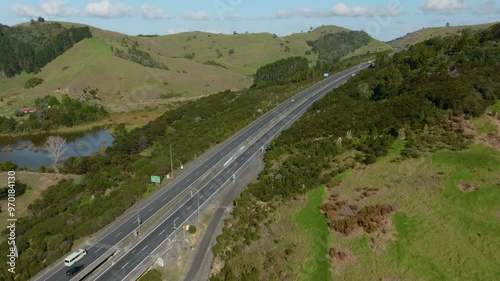 Traffic on State Highway 1 motorway   Waiwera, Auckland, New Zealand. photo