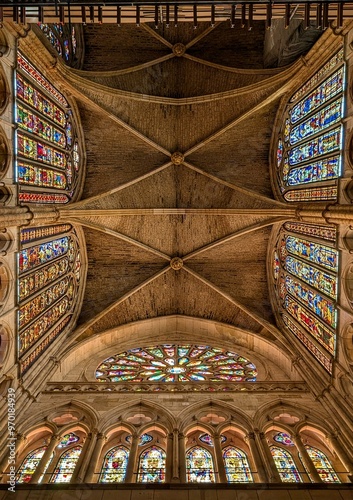 Interior of León Cathedral Showcasing Stunning Stained Glass Windows and Majestic Dome