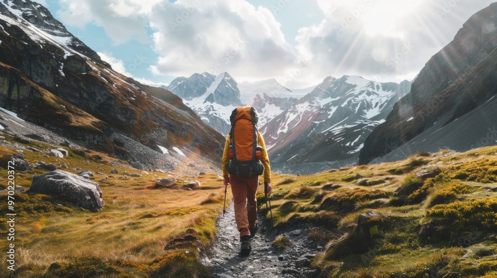 Adventurous Hiker in Majestic Mountain Range Adventurous Hiker in Majestic Mountain Range