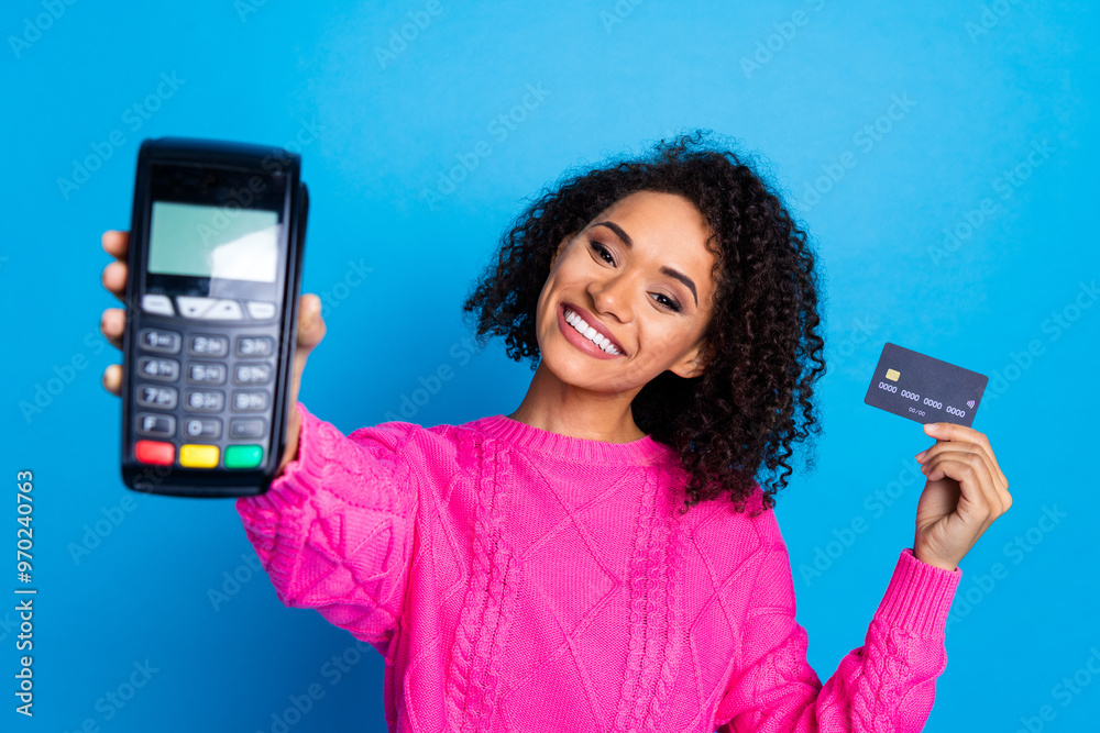 Photo of shiny attractive lady dressed knitted pullover holding bank card payment machine isolated blue color background Photo of shiny attractive lady dressed knitted pullover holding bank card payment machine isolated blue color background