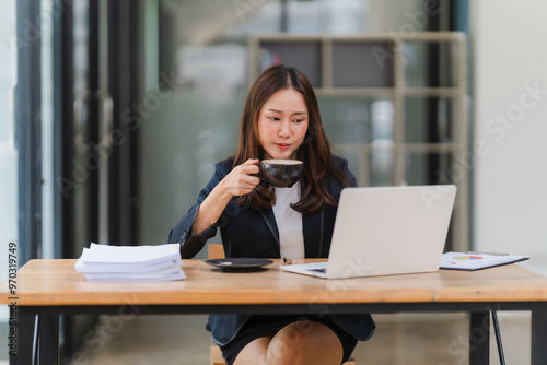 Focused Professional Savoring Coffee Break at Work 