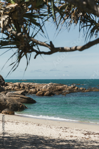 Clear blue water and white sand beach
