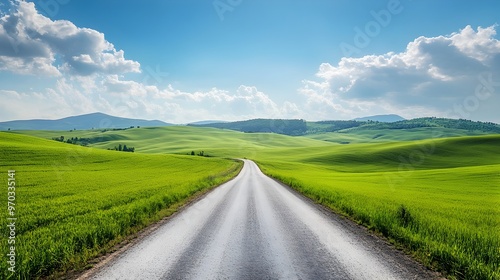 Winding Country Road Through Lush Green Hills Symbolizing Adventure and