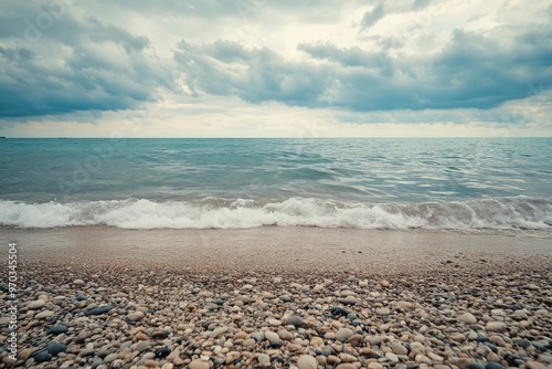 sea and cloudy sky with beach sand in the foreground , ai