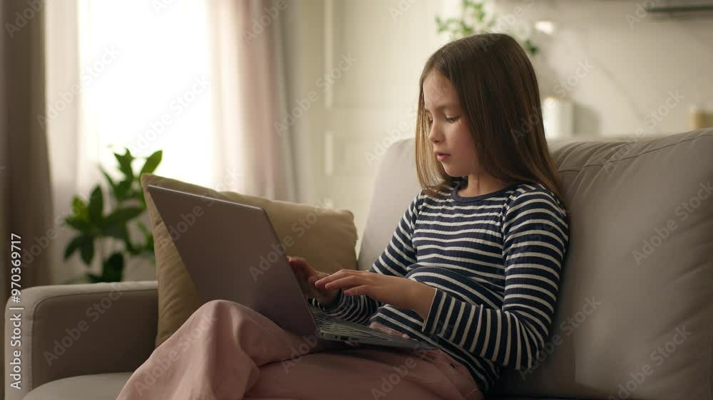 Little girl using laptop desktop computer pc technology gadget child daughter preteen texting typing device cyberspace kid networking home funny communicating browse virtual e-learning online educate Little girl using laptop desktop computer pc technology gadget child daughter preteen texting typing device cyberspace kid networking home funny communicating browse virtual e-learning online educate