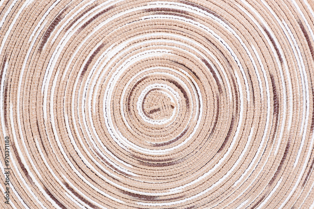 Swirly brown white and tan circular patterned mat Swirly brown white and tan circular patterned mat