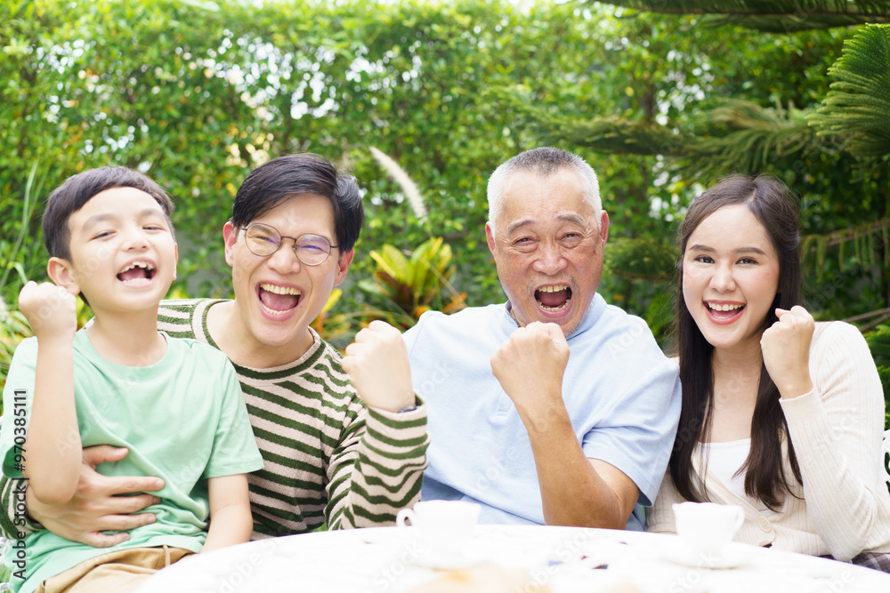 Multi generation Asian family relaxing in backyard garden together. Multi generation Asian family relaxing in backyard garden together.