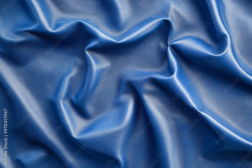 Blue artificial leather with folds and waves on PVC base Blue artificial leather with folds and waves on PVC base