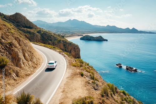 White car driving on the coastal road. road landscape in summer. it's nice to drive on beach side highway. Highway view on the coast on the way to summer vacation. Spain trip on beautiful travel , ai
