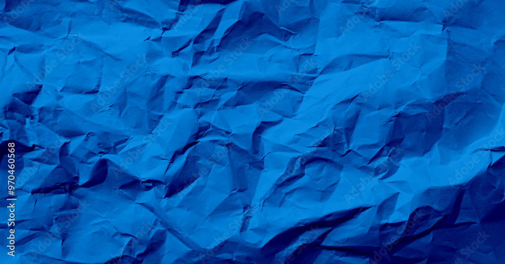 Fototapeta premium Blue abstract background paper crumpled crease wallpaper rough art scrapbook, card cosmetic product or business finance, template empty vintage wallpaper summer travel, texture sheet wrinkled.
