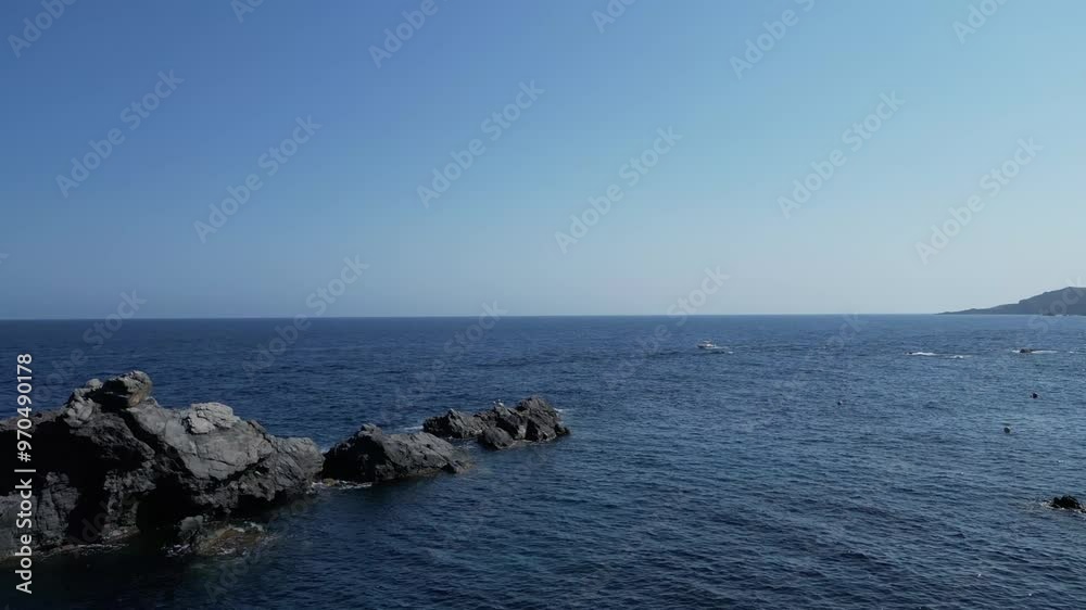 A mesmerizing aerial cinematic capture of Cabo de Palos, showcasing its crystal-clear ocean waters, rugged coastline, and the serene beauty of this Spanish coastal paradise A mesmerizing aerial cinematic capture of Cabo de Palos, showcasing its crystal-clear ocean waters, rugged coastline, and the serene beauty of this Spanish coastal paradise