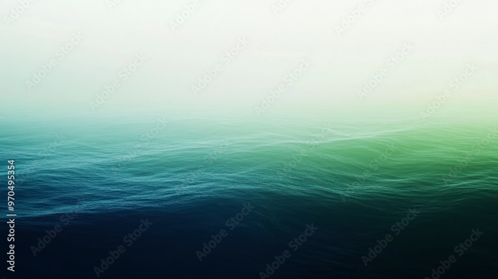 Fototapeta premium A smooth gradient background transitioning from deep sea blue to lush green, evoking the essence of nature.