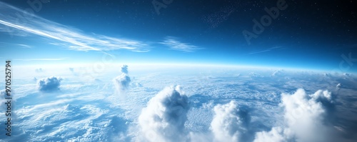 Breathtaking aerial view of Earth's curvature above the clouds and serene blue sky, illustrating the planet's beauty and vastness. photo