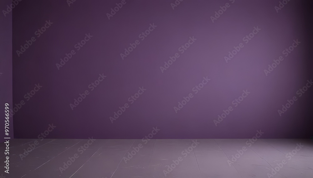 An empty room with a purple wall and a wooden floor. An empty room with a purple wall and a wooden floor.