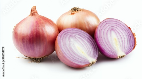 Three red onions, one whole and two halved, isolated on a white background.