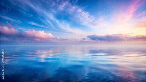 Tranquil seascape with billowing mist in pale blue and lavender hues