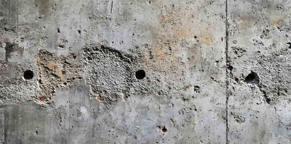 Weathered Concrete Wall with Holes and Patches Weathered Concrete Wall with Holes and Patches