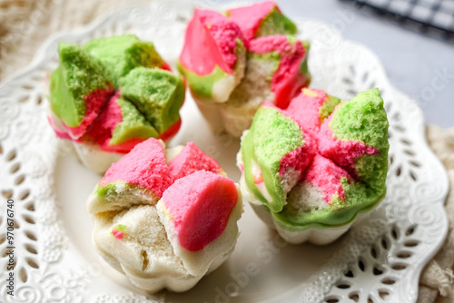 Colourful Blossom Steamed Cupcake or Apam Mekar photo