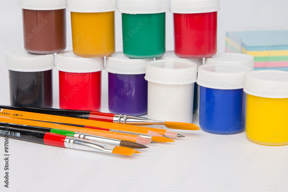 Paint brushes of different sizes and drawing paints Paint brushes of different sizes and drawing paints