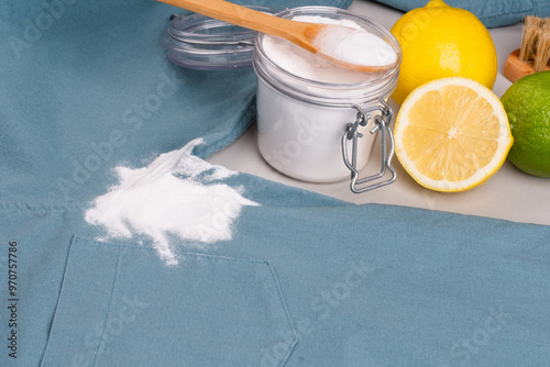 Natural cleaning method to remove sweat stains under the armpits. Eco-friendly remove stains from clothes using baking soda. Embracing a zero-waste lifestyle. top view. photo