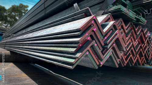 Equal Angles Steel angle iron Metal profile angle in packs at the warehouse of metal products. Metal rolled angle bar.Galvanized steel angle bundle in industrial stockyard., steel profile materials.