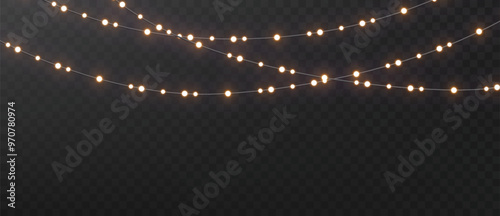 Christmas string lights isolated. Glowing realistic garlands on dark background. Holiday shimmering lights.