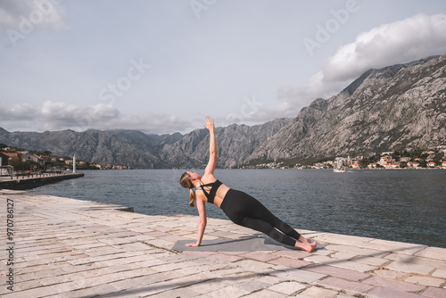 Workout.Fit,Gym sports workout outdoor urban.Fit,gym motivation,wellness.Woman exercising outdoors sea.Health,nature,fitness,eco fit.mental health.exercise, physical health,gym nature,fitness urban photo