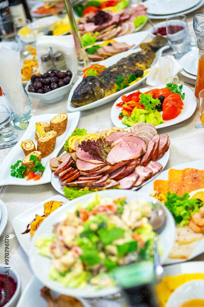 A Colorful Spread of Delicious Dishes at a Festive Gathering in a Restaurant. A Colorful Spread of Delicious Dishes at a Festive Gathering in a Restaurant.