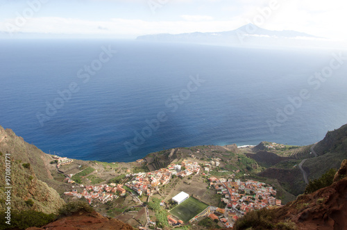 Town of Agulo and island of Tenerife in the background. La Gomera. Canary Islands. Spain. photo