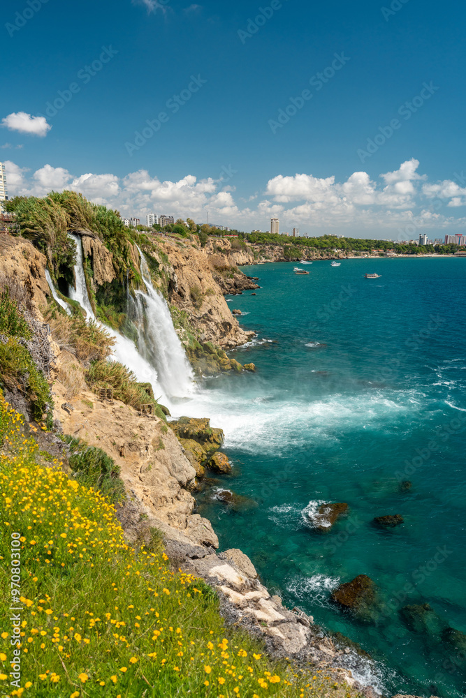 Obraz premium Lower Duden Waterfall in Duden Park, which flows from the cliffs in Antalya, Turkey into the Mediterranean Sea