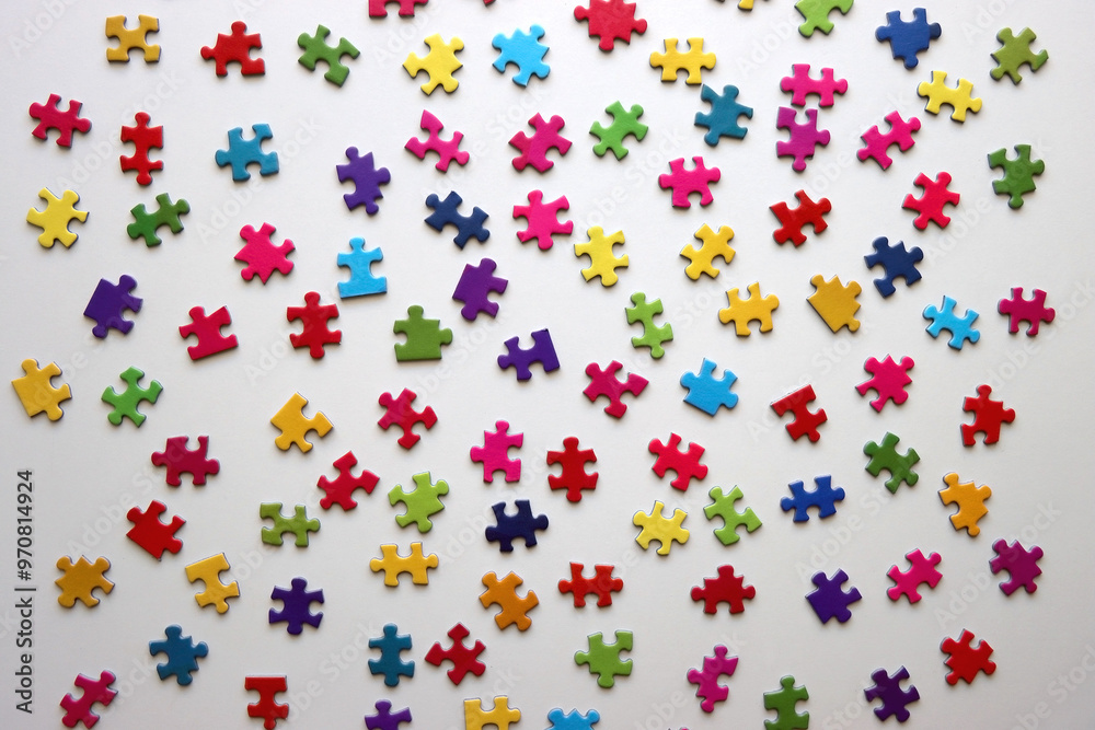 Colorful jigsaw puzzle pieces on white background. Flat lay. Colorful jigsaw puzzle pieces on white background. Flat lay.