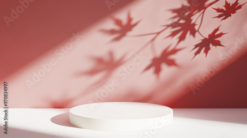 White empty round podium with soft maple leaf shadows on a warm red background. Product display background with copy space