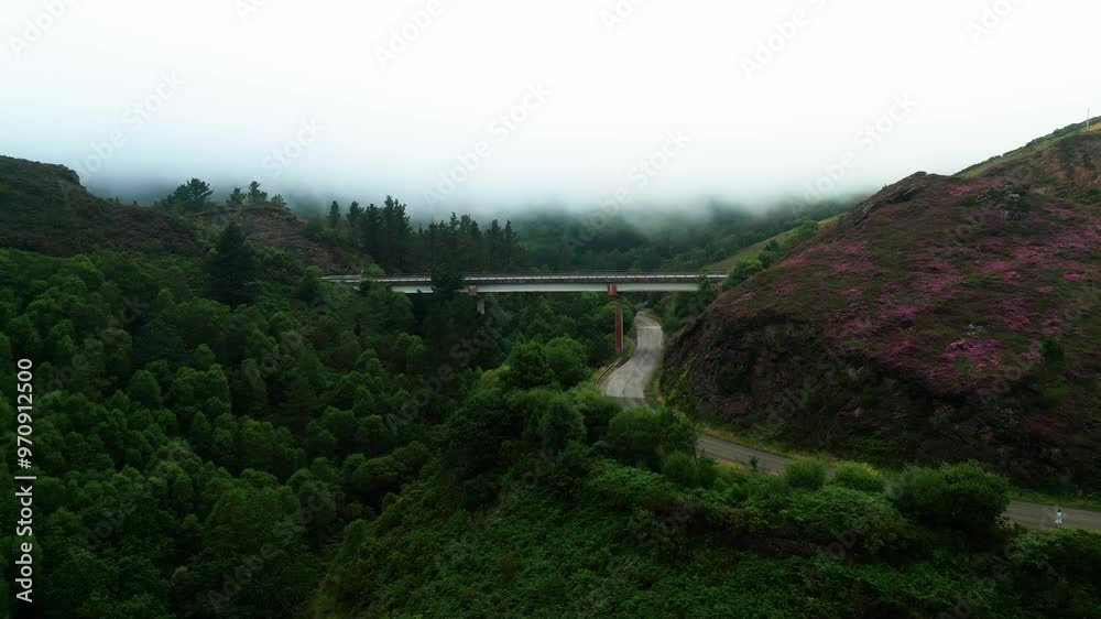 Bridge in the middle of the field with cloud above Bridge in the middle of the field with cloud above