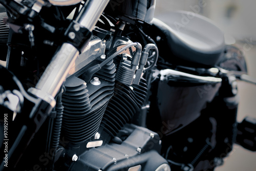 Black motorcycle engine with two V-cylinders