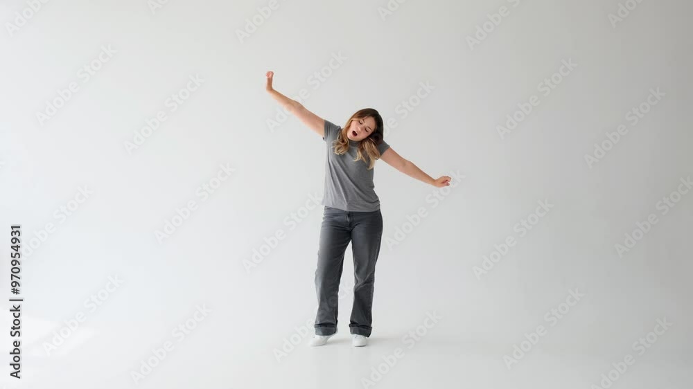 Asleep young adult Caucasian woman suffering from tiredness or boredom, yawning and stretching on white background. Concept of a loneliness, fatigue. Asleep young adult Caucasian woman suffering from tiredness or boredom, yawning and stretching on white background. Concept of a loneliness, fatigue.