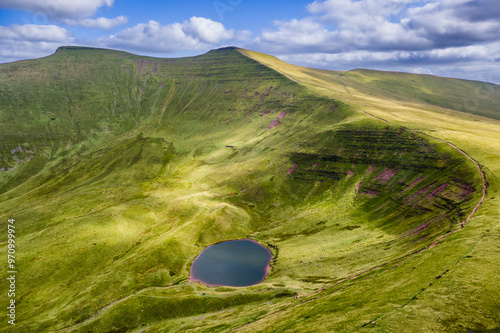 Aerial view of Pen-y-Fan, Corn Du and Cwm Llwch lake in the Brecon Beacons National Park, Wales photo