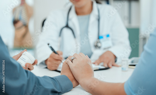 Hospital, holding hands and doctor with couple for consulting, wellness and fertility appointment. Healthcare, gynecology clinic and man and woman for medical service, insurance and ivf treatment