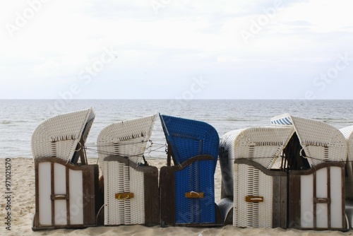 Fototapeta Naklejka Na Ścianę i Meble -  beach chairs around the sea