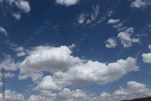 sky, cloud, clouds, blue, nature, white, weather, cloudscape, air, heaven, day, cloudy, fluffy, atmosphere, sun, summer, light, skies, cumulus, sunny, meteorology, bright, wind, clear, landscape