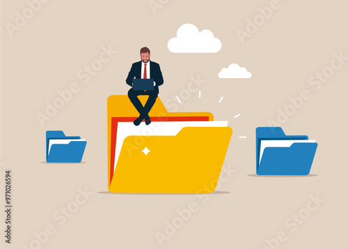 Organize document files into archive folders on the computer. Employee working remotely with laptop on files folder. Remote job or distance work, virtual office or working anywhere
