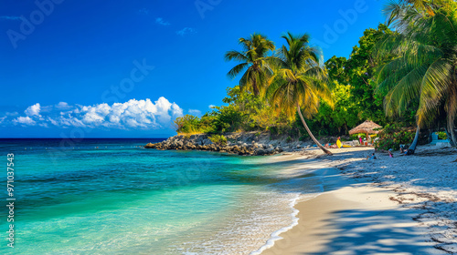 Pristine tropical beach with turquoise waters, white sand, and lush palm trees under a bright blue sky.