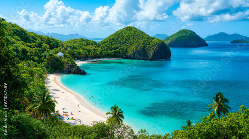 Pristine tropical beach with turquoise waters and lush green hills under a clear blue sky.