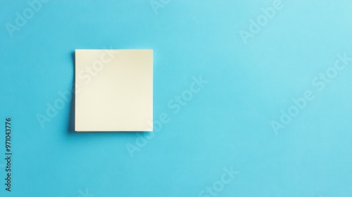 Crisp note paper positioned on a blue panoramic background offering clear space for text or messaging in a serene layout